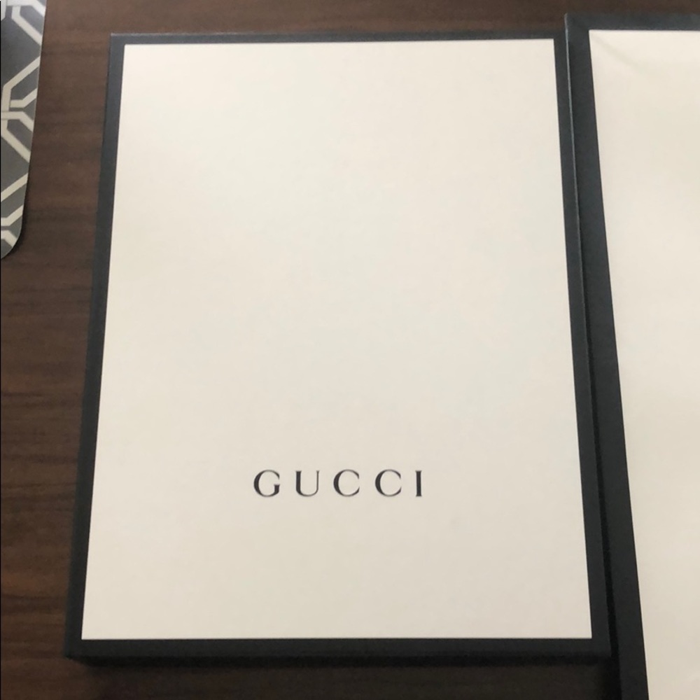Gucci box and shopping bag